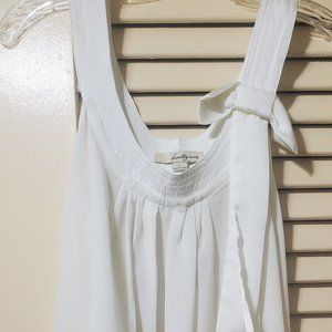 Sleeveless off-white women's top. Made by "Twenty0ne", 100% polyester, large.
